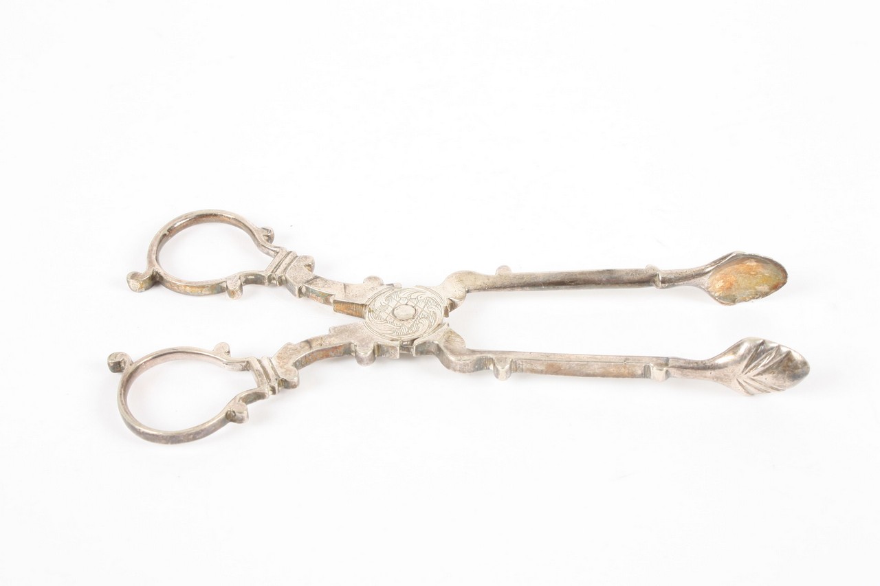 A pair of Georgian sugar nips, unmarked but probably silver. 13.5cm long in good overall condition
