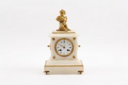 A Victorian onyx and gilt brass mantel clock, crested with a cherub playing pipes, the white