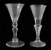 Two 18th century drinking glasses, one with baluster stem and trumpet shaped bowl, the other with