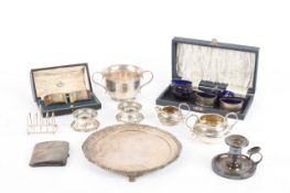 A collection of assorted silver, comprising, a silver salver, two small candlestick stands, a