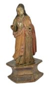 A 17th/18th painted and carved wooden figure of a saint, Continental, with painted golden cloak