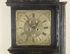 Jonathan Lowndes: A japanned longcase clock circa 1705, the 12-inch brass dial signed Jonat. Lowndes