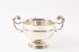 A large late Victorian silver bowl, hallmarked Sheffield 1901, with petal shaped rim and mounted