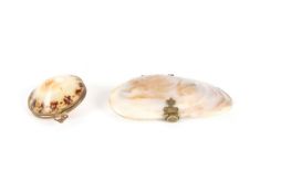 A large shell purse and another, early 20th century, the larger with decorative brass clasp and