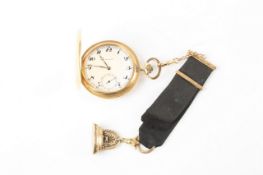 A gentleman`s Movado hunter pocket watch, with 14ct gold case, white enamel dial, with gold fob seal