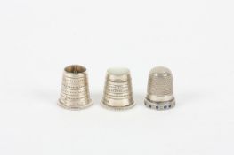 Three silver thimbles one by Charles Horner, the Horner thimble with Chester 1912 hallmark and