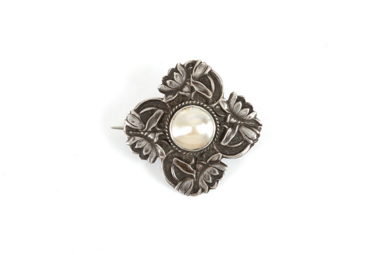 An Art Nouveau Charles Horner silver and pearl brooch, hallmarked Chester, 1909, a shaped square