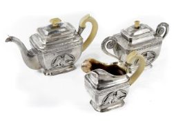 A Russian silver three piece tea set by Mikhail Karpinsky, Moscow, circa 1826, with ivory knops