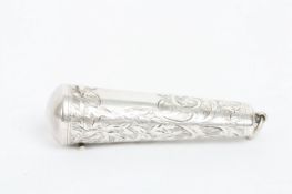 An Edwardian silver needle case, hallmarked Birmingham 1902, the tapered container chased with