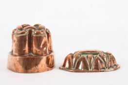 Two copper Victorian jelly moulds, the largest 11cm high Both with some dents and general wear