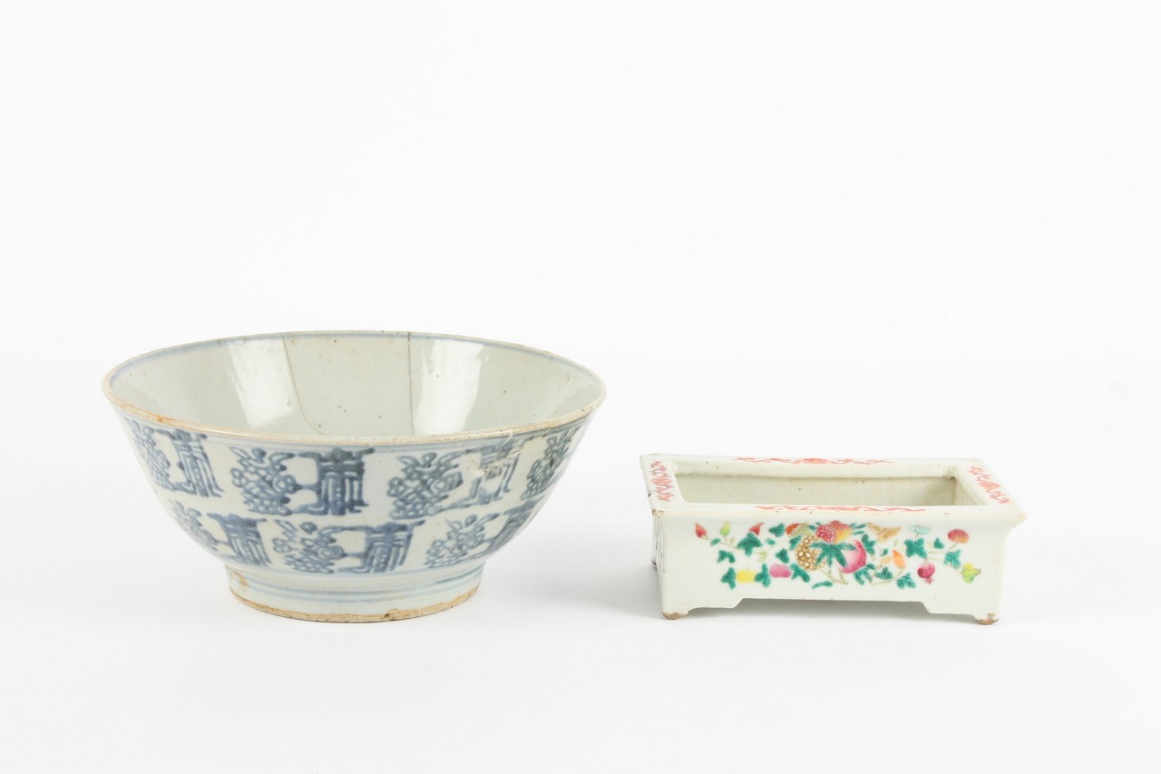 A 19th century Chinese blue and white bowl, decorated with symbols, together with a Chinese