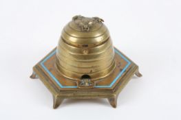 A novelty brass ink well in the form of a beehive, on a hexagonal base. 11cm high With replaced