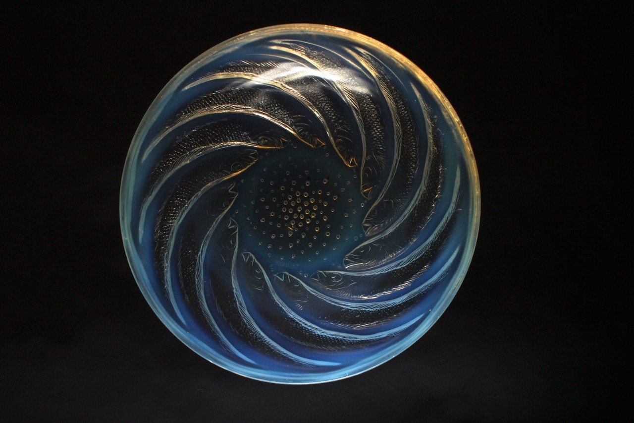 A René Lalique `Poissons` opalescent bowl, circa 1921, with spiralling fishes and bubbles, with