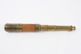 A three draw brass refracting telescope circa 1850 signed T.G.P. Osbourne London, with dust slide to