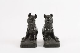 A pair of 19th century Grand Tour carved Serpentine marble `Jennings dogs` modelled after the