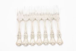 A set of seven Victorian silver forks hallmarked London 1860, the stems with thread and shell