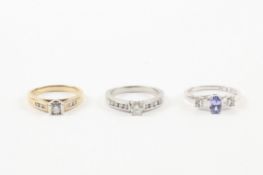 Two 9ct gold and diamond rings one set with central diamond and diamond-set shoulders, and