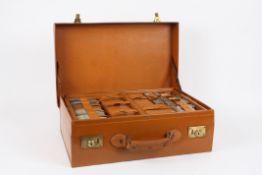 A gentleman`s Mappin and Webb tan leather dressing case  in very good condition, the case with