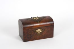 A late 19th century gothic tea caddy with domed lid and two inner compartments, the escutcheon and