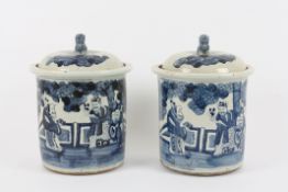 A large pair of Chinese earthenware plum storage pots and covers the bodies of cylindrical form