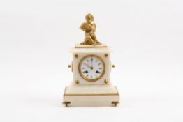 A Victorian onyx and ormolu mantle clock crested with a gilt spelter cherub playing pipes, the white