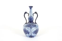 A large Macintyre & Co. Florian ware vase designed by William Moorcroft dated 1898, with bulbous