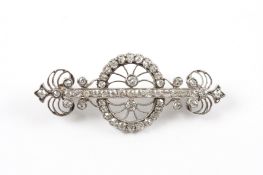 A Victorian diamond and 18ct white gold bar brooch formed as a a pair of half moon rings of diamonds