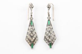 A pair of Art Deco style costume jewellery earrings formed as suspended arrow heads with rows of