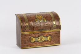 An Arts and Craft copper stationery box the hammered copper box with brass strap work design and