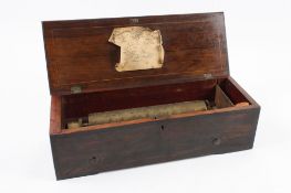 A Victorian rosewood cased musical box circa 1880, with Swiss key-wound movement playing 6 airs on a