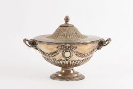 A large Victorian silver plated Adam design tureen and cover of oval form, the body embossed with