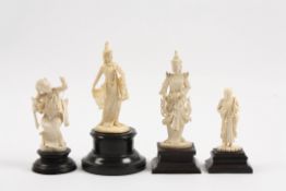 A group of four early 20th century Indian carved ivory figures comprising a lady with pierced shawl,