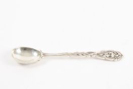 An Omar Ramsden Art Nouveau silver spoon hallmarked London 1930, with hammered bowl, the stem