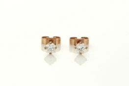 A pair of 9ct gold diamond ear studs each stone approximately 0.13-0.14cts. Good condition, no