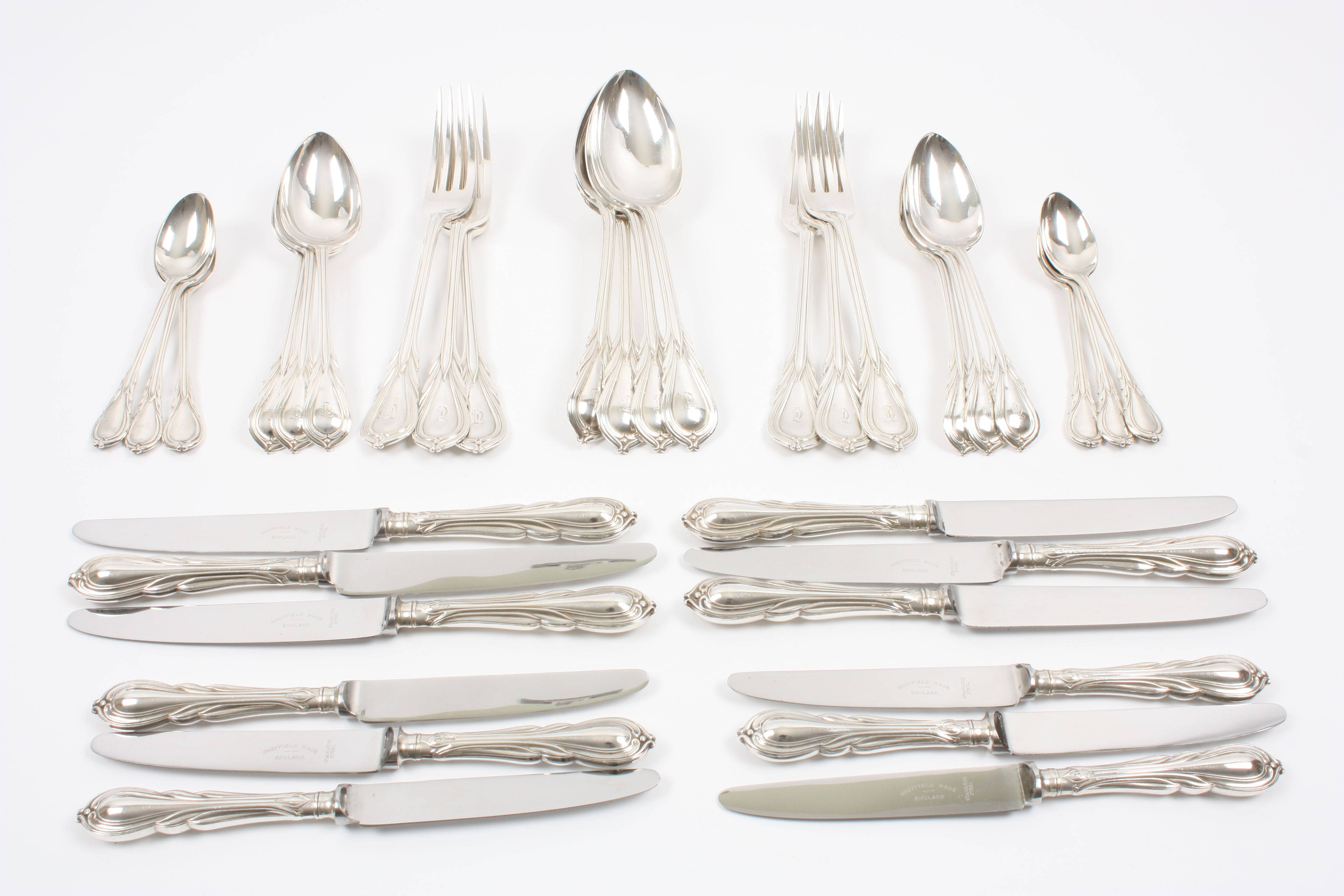 A Victorian and later Lily pattern canteen of silver cutlery Hallmarked London 1872, Sheffield