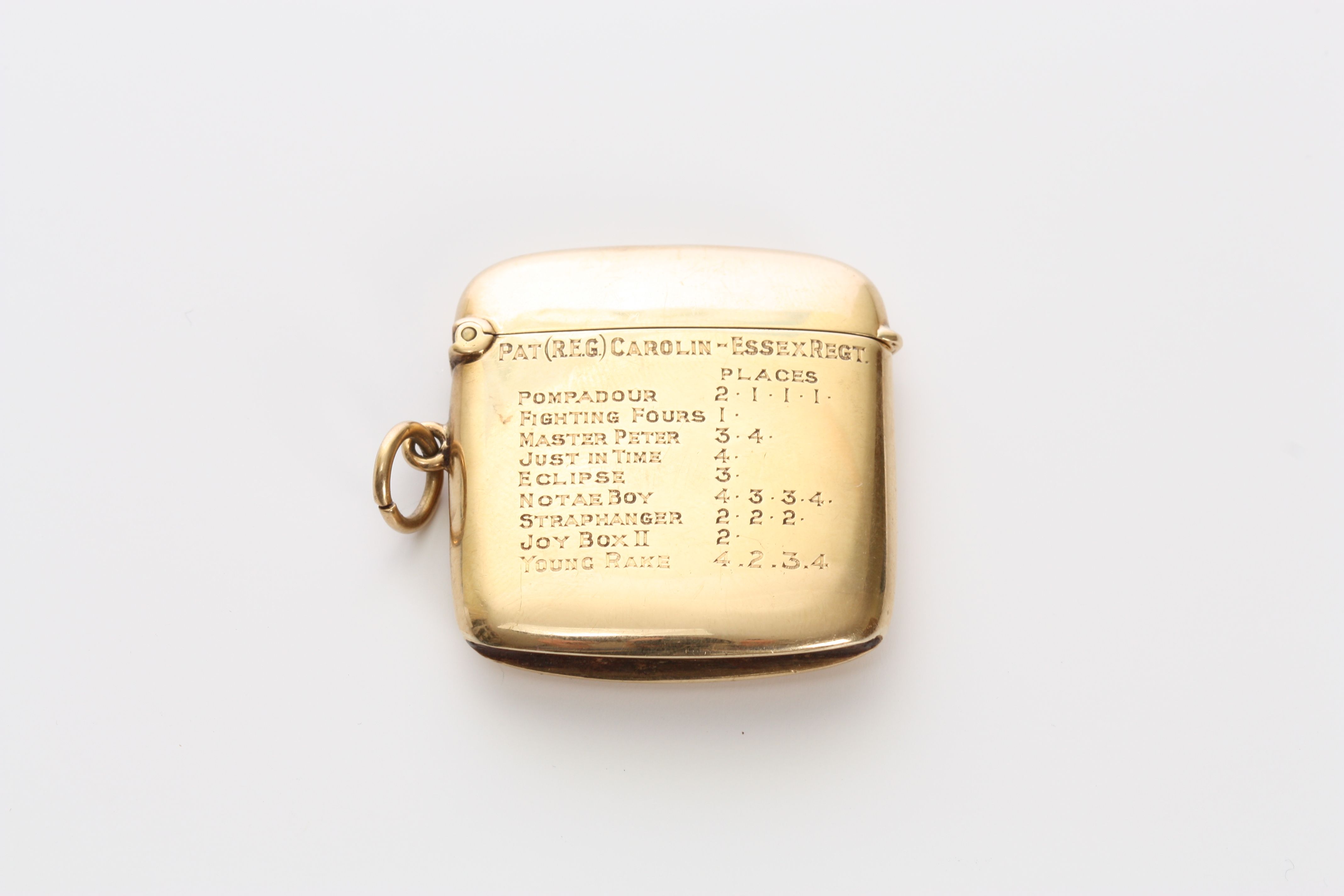 A George V 9ct gold military vesta case hallmarked Birmingham 1922 and with engraved inscription: `