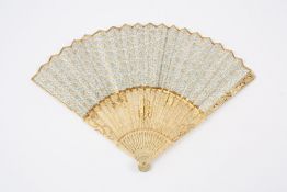 A late 18th century Chinese carved ivory and paper fan  the outer guard sticks carved with birds,