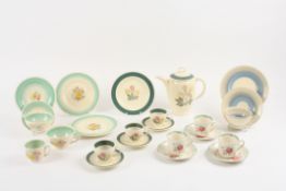 A Collection of assorted Susie Cooper cups and saucers comprising a coffee pot and three matching