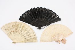 Two late 19th century sequin fans comprising a cream silk fan with applied gold coloured sequins and