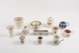 A Collection of assorted Poole comprising two posy pots, three vases, two jugs and five pots of