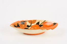 A Clarice Cliff oval `Orange Chintz` dish painted with orange and brown fruits and black painted