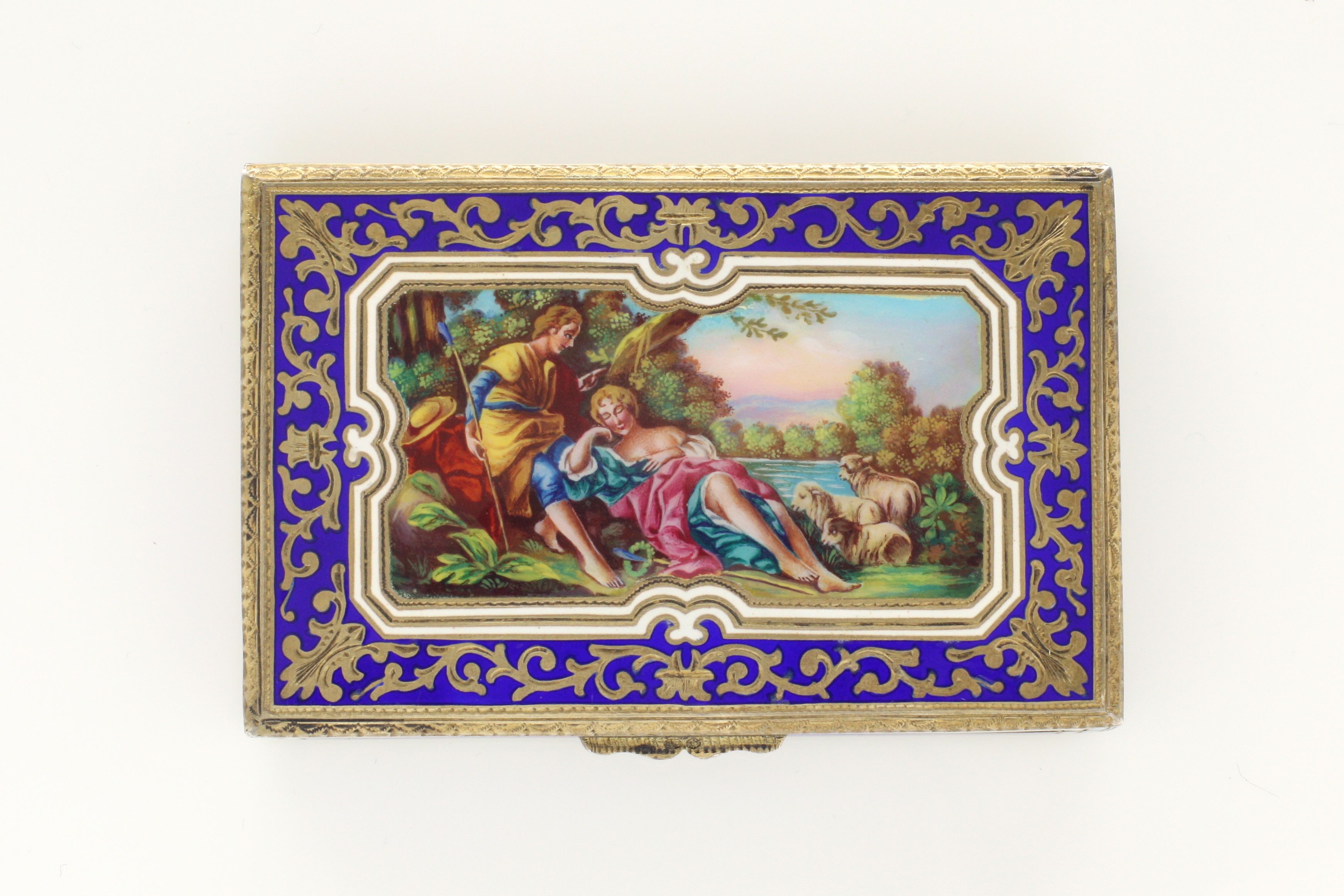 A continental silver gilt and enamel box the top finely decorated with an enamel scene of figures