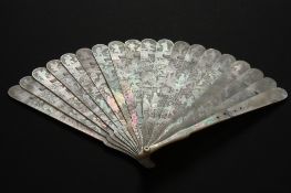 An unusual early 19th century mother of pearl fan Chinese, circa 1820 finely decorated on both sides