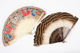 A Chinese mid 19th century bone and feather fan the feathers brightly painted and decorated with