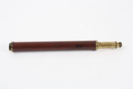 An early 19th century single draw brass and mahogany refracting telescope unsigned, with bulbous