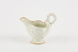 An 18th century porcelain dolphin ewer creamboat Worcester circa 1770 of traditional moulded shell