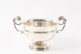 A large late Victorian silver bowl hallmarked Sheffield 1901, with petal shaped rim and mounted with