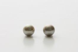 A pair of 11mm Tahitian cultured pearl ear studs with 18ct white gold mounts. Good condition.