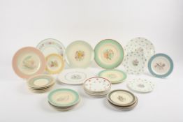 A Collection of assorted Susie Cooper side plates comprising 24 assorted side plates and larger