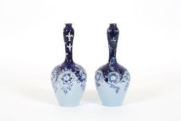 Two Macintyre & Co. Florian ware vases designed by William Moorcroft dated 1898, with bulbous